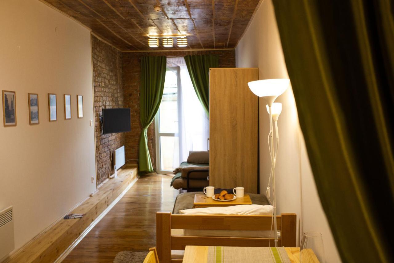 לבוב Peaceful Studio On Rynok Square מראה חיצוני תמונה